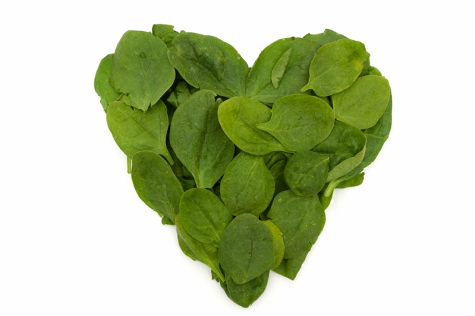 Spinach leaves made into a heart shape