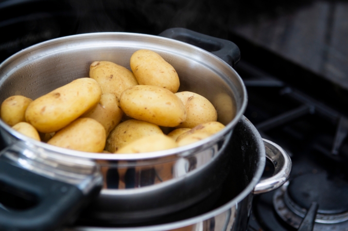 A pan of just boiled jersey royal new potatoes